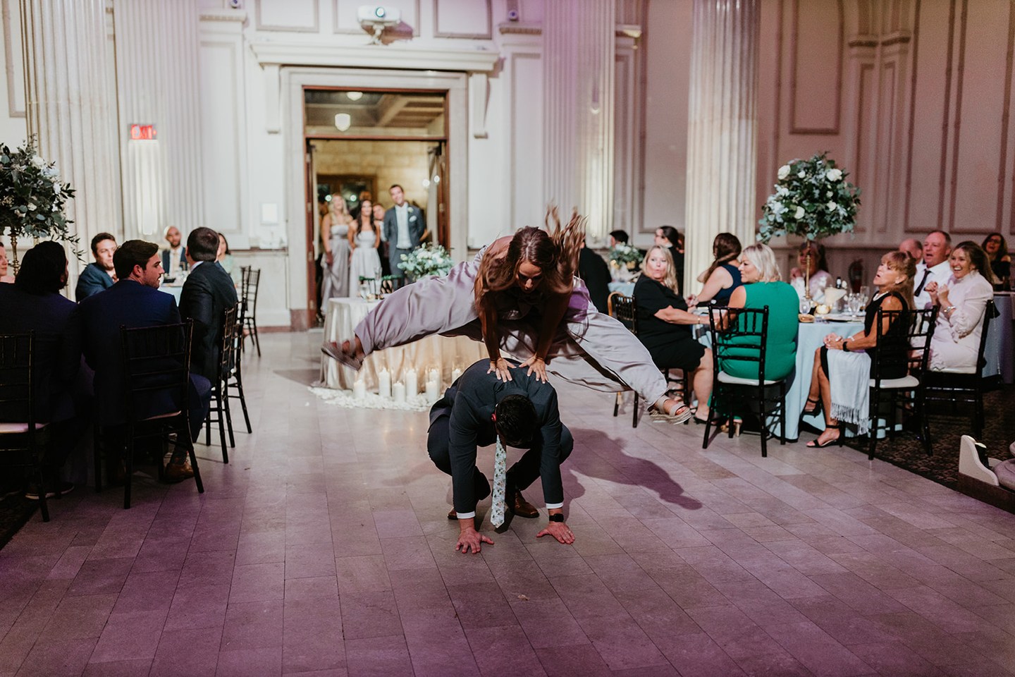 Lively wedding reception with bridesmaids and groomsmen