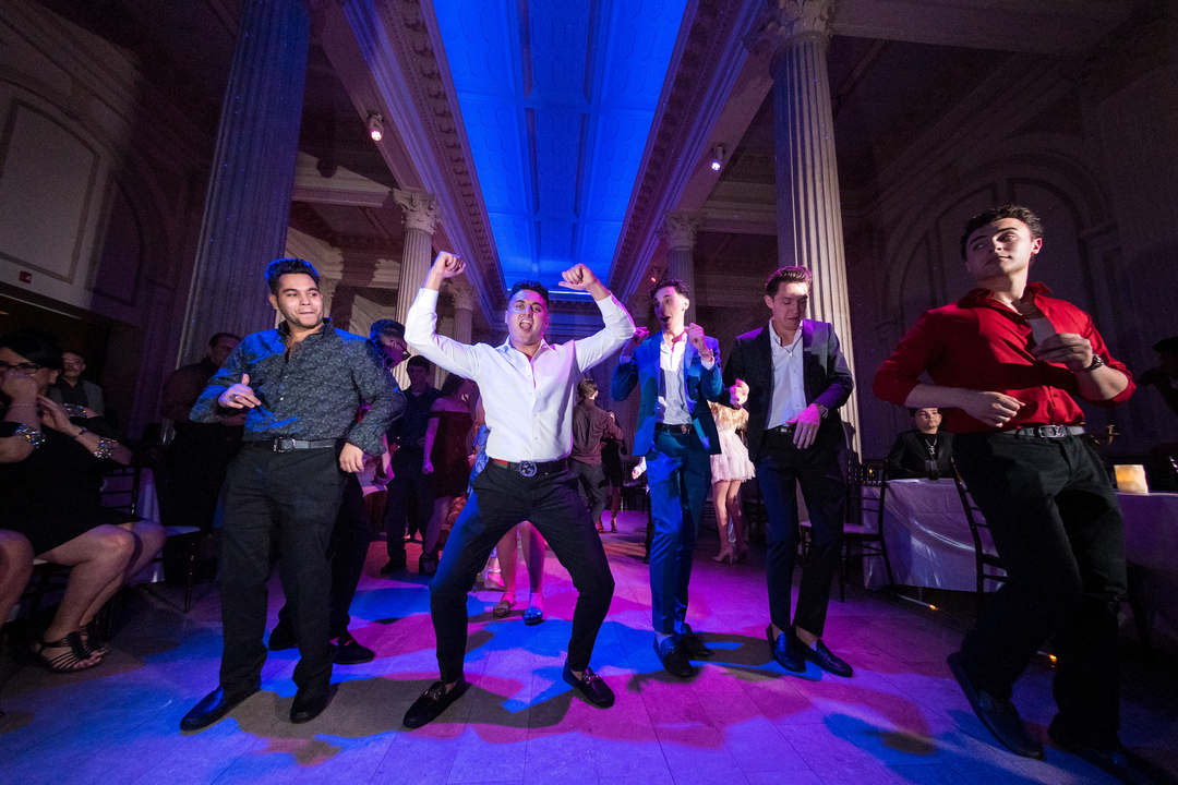 Energetic party dancing with colorful lighting