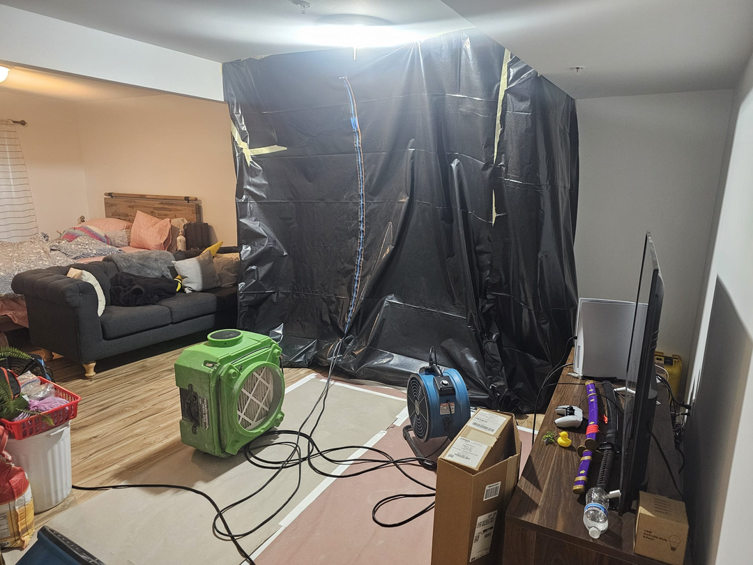 Living room water damage restoration in progress